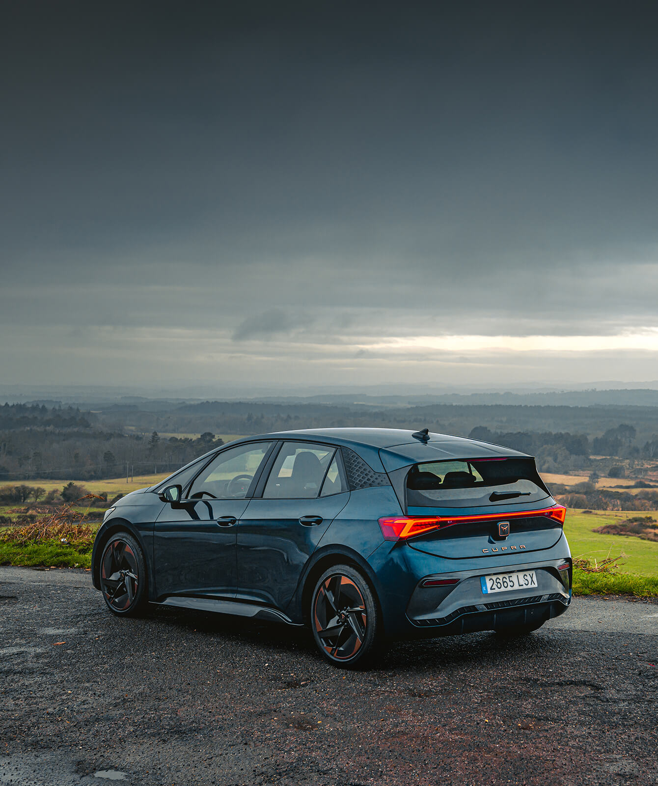 Cupra Born Aurora Blue with Blizzard Aéro Cuivrée et Noires wheels